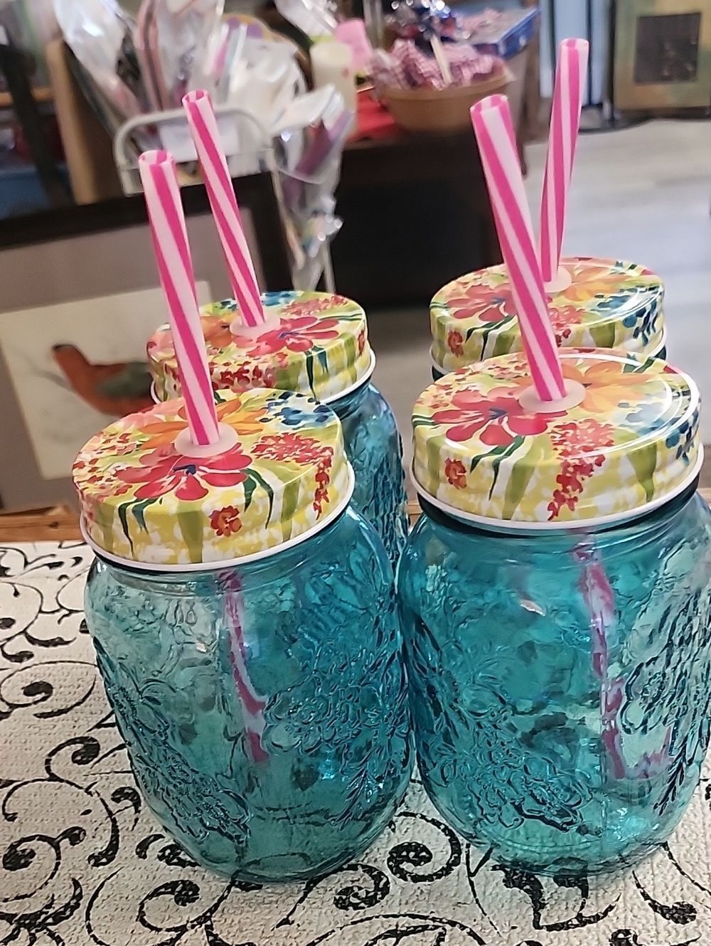 Pioneer Woman Mason-Style Drinking Jars with Floral Lids and Pink Straws